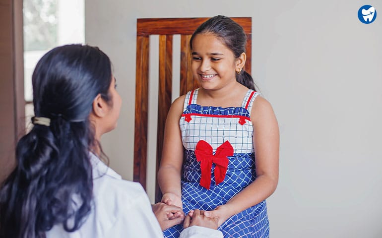 Pediatrician Talking To Child